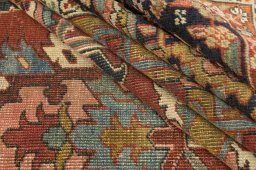 Corner detail of 1900s Antique Carpets rug showing border pattern and Wool pile