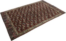 Close-up detail of 1880s Antique Carpets rug from Uzbekistan showing Wool weave