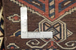 Close-up detail of 1880s Antique Carpets rug from Uzbekistan showing Wool weave