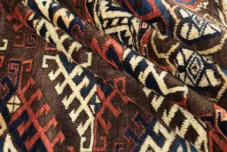 Full view of 1880s Antique Carpets rug from Uzbekistan, 330 × 202 cm in Brown tones