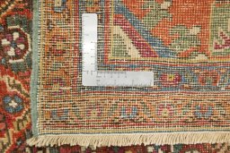 Corner detail of 1880s Antique Carpets rug showing border pattern and Wool pile