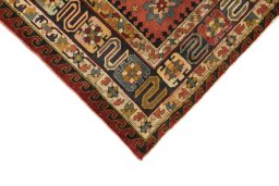 Backside of handmade 1930s Antique Carpets rug showing knot structure and weave density