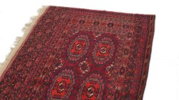Backside of handmade 1900s Antique Carpets rug showing knot structure and weave density