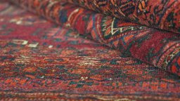Close-up detail of 1900s Antique Carpets rug from Uzbekistan showing Wool weave