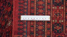 Full view of 1900s Antique Carpets rug from Uzbekistan, 148 × 75 cm in Dark red tones