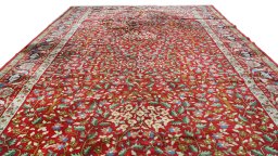 Surface texture of 1930s Antique Carpets rug with natural Wool and intricate pattern