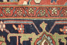 Corner detail of 1900s Antique Carpets rug showing border pattern and Wool pile