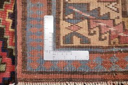Close-up detail of 1880s Antique Carpets rug from Iran / Persia showing Wool weave