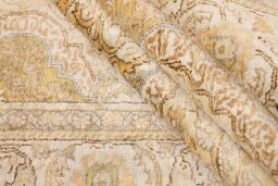 Corner detail of 1920s Antique Carpets rug showing border pattern and Silk pile