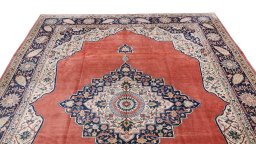 Backside of handmade 1910s Antique Carpets rug showing knot structure and weave density