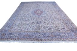 Corner detail of 1920s Antique Carpets rug showing border pattern and Wool pile