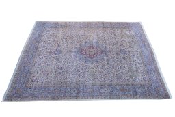 Corner detail of 1920s Antique Carpets rug showing border pattern and Wool pile