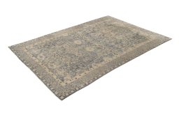 Corner detail of 1920s Antique Carpets rug showing border pattern and Wool pile