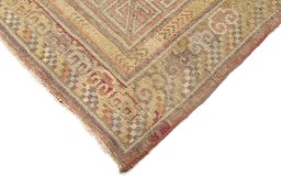 Backside of handmade 1900s Antique Carpets rug showing knot structure and weave density