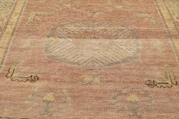 Close-up detail of 1900s Antique Carpets rug from Uzbekistan showing Wool weave