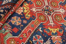 Corner detail of 1900s Antique Carpets rug showing border pattern and Wool pile