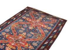 Surface texture of 1900s Antique Carpets rug with natural Wool and intricate pattern