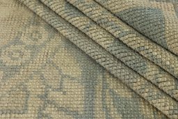 Corner detail of 1920s Antique Carpets rug showing border pattern and Wool pile