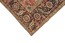 Backside of handmade 1920s Antique Carpets rug showing knot structure and weave density