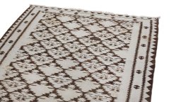Surface texture of 1920s Kilim Antique rug with natural Wool and intricate pattern