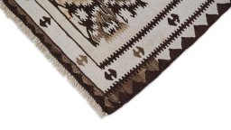 Backside of handmade 1920s Kilim Antique rug showing knot structure and weave density