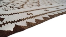 Central medallion detail of 1920s Kilim Antique rug from Iran / Persia