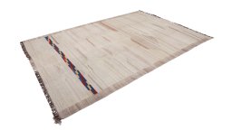 Close-up detail of New Kilim Antique rug from Iran / Persia showing Wool weave
