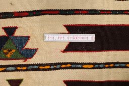Corner detail of 1900s Kilim Antique rug showing border pattern and Wool pile