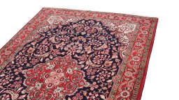 Surface texture of 1950s Semi-antique Carpets rug with natural Wool and intricate pattern