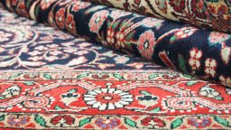 Close-up detail of 1950s Semi-antique Carpets rug from Iran / Persia showing Wool weave