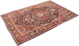 Corner detail of 1950s Semi-antique Carpets rug showing border pattern and Wool pile