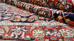 Close-up detail of 1950s Semi-antique Carpets rug from Iran / Persia showing Wool weave