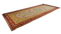 Corner detail of 1970s Semi-antique Carpets rug showing border pattern and Wool pile