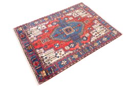 Corner detail of 1970s Semi-antique Carpets rug showing border pattern and Wool pile