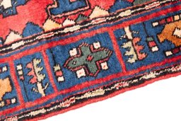 Backside of handmade 1970s Semi-antique Carpets rug showing knot structure and weave density