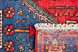 Close-up detail of 1970s Semi-antique Carpets rug from Iran / Persia showing Wool weave