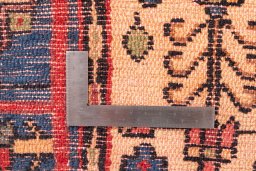 Corner detail of 1970s Semi-antique Carpets rug showing border pattern and Wool pile