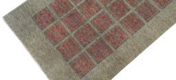 Backside of handmade New Farahan rug showing knot structure and weave density