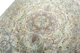 Backside of handmade New Tabriz 50/60/70 Raj rug showing knot structure and weave density