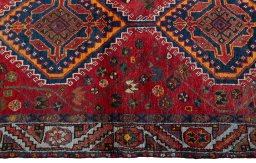 Close-up detail of 2000s Shiraz rug from Iran / Persia showing Wool weave