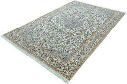 Corner detail of 2000s Nain rug showing border pattern and Wool pile