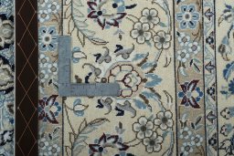 Backside of handmade 2000s Nain rug showing knot structure and weave density