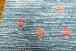 Backside of handmade New Kilim Dastan rug showing knot structure and weave density
