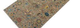 Backside of handmade New Farahan rug showing knot structure and weave density