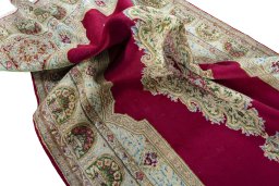 Surface texture of 1970s Kerman rug with natural Wool and intricate pattern