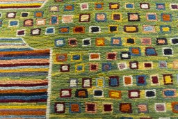 Backside of handmade New Kilim Dastan rug showing knot structure and weave density