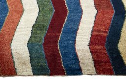 Central medallion detail of 2000s Persian Gabbeh rug from Pakistan