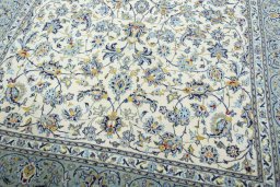 Close-up detail of 2000s Kashan rug from Iran / Persia showing Wool weave