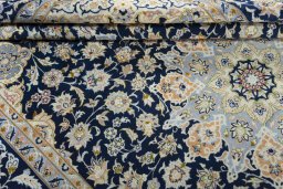 Close-up detail of 2000s Najafabad rug from Iran / Persia showing Wool weave