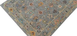 Backside of handmade New Farahan rug showing knot structure and weave density